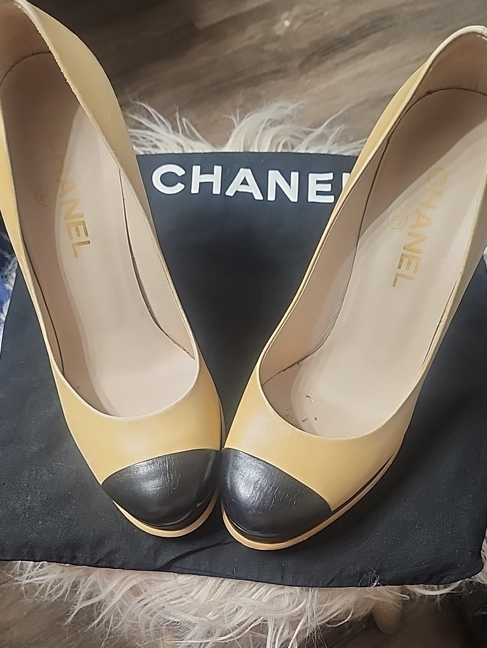 CHANEL Yellow Leather Pumps with Black Cap Toe